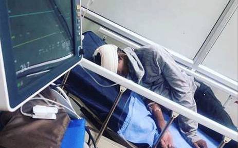 Thabang Mosiako pictured in hospital following an attack. Picture: facebook.com