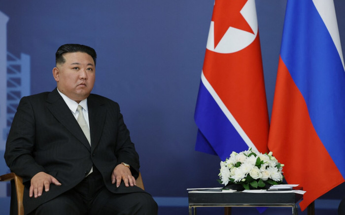North Korea’s Kim warns Washington as biggest ICBM launched