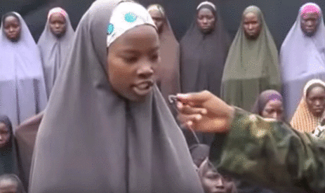 A screengrab from Sunday's video in which one of the girls is seen making an appeal on behalf of the other Chibok girls.