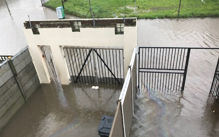 Cape Town heavy rain left the streets of Hanover Park flooded. Some residents are trapped in their homes. Picture: Monique Mortlock/EWN.