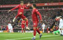 Liverpool's Roberto Firminho and Alex Oxlade-Chamberlain celebrate a goal against Brentford in their English Premier League match on 16 January 2022. Picture: @LFC/Twitter