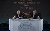 General Delegate of the Cannes Film Festival Thierry Fremaux (L) speaks past President of the Cannes Film Festival Pierre Lescure during the presentation of the 75th Cannes Film Festival Official Selection at the UGC Normandie cinema in Paris on April 14, 2022.