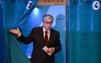 Kazakh President and presidential candidate Kassym-Jomart Tokayev walks out of a voting booth at a polling station during Kazakhstan's presidential elections in Nur-Sultan on 9 June 2019.  Picture: AFP
