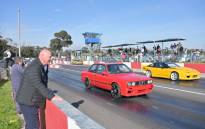 City of Cape Town Mayoral Member for Economic Growth and Tourism, James Vos (foreground, left), at a drag-racing event at the Killarney International Raceway in Cape Town. Picture: @VosJames/Twitter