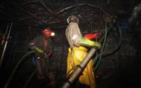 Miners at work in a mine shaft. Picture: AFP