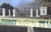 Smoke billows out of the National Assembly building following a blaze on 2 January 2022. Picture: Lauren Isaacs/Eyewitness News