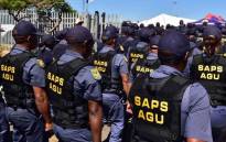 FILE: Members of the SA Police Service’s Anti-Gang Unit are seen in Hanover Park, Cape Town, during the launch of the specialised unit on 2 November 2018. Picture: @SAgovnews/Twitter