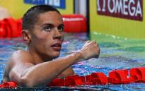 Romania's David Popovici reacts after winning the men's 200m freestyle semifinals during the Budapest 2022 World Aquatics Championships at Duna Arena in Budapest on 19 June 2022. Picture; Attila KISBENEDEK/AFP