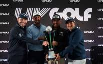 Members of the Stinger team (from L) South African golfers Branden Grace, Charl Schwartzel, Louis Oosthuizen and Hennie Du Plessis pose with the trophy at the end of the third and final day of the LIV Golf Invitational Series event at The Centurion Club in St Albans, north of London, on 11 June 2022. Picture: Adrian DENNIS/AFP