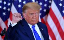 FILE: Former US President Donald Trump pumps his fist after speaking during election night in the East Room of the White House in Washington, DC, early on 4 November 2020. Picture: AFP