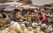 Tourists shop around in the old city of Morocco's Marrakesh on 12 May 2022. Picture: FADEL SENNA/AFP