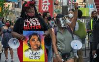 FILE: Protesters gather at Times Square to march uptown via the Henry Hudson Parkway on August 9, 2020 in New York City. Protesters took to the streets to demand the arrest of the officer responsible for the death of Breonna Taylor on March 13, 2020 in Louisville, Kentucky.