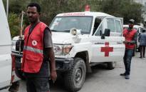 FILE: Red Cross ambulances are seen waiting on stand-by for authorisation to travel to Togoga, a village about 20km west of Mekele, where an alleged airstrike hit a market leaving an unknown number of casualties. Red Cross ambulances are standing by after being denied access to the site, at the Ayder referral hospital in Mekele, the capital of Tigray region, Ethiopia, on 23 June 2021. Picture: Yasuyoshi Chiba/AFP