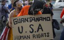 A man demonstrates against the US Guantanamo prison ahead of the Peoples Summit to be held in parallel with the VII Americas Summit, in Panama City on 9 April, 2015. Picture: AFP.