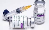 FILE: Vials of the AstraZeneca COVID-19 vaccine and a syringe. Picture: Joel Saget/AFP