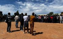 Mineworkers gathered at the Blyvoor Gold mine near Carletonville amid a labour dispute on 17 November 2023. Picture: Nokukhanya Mntambo/Eyewitness News
