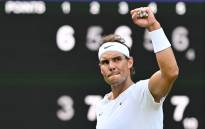 Spain's Rafael Nadal celebrates winning against US player Taylor Fritz after winning his men's singles quarterfinal tennis match on the tenth day of the 2022 Wimbledon Championships at The All England Tennis Club in Wimbledon, southwest London, on 6 July 2022. Picture: Glyn KIRK/AFP