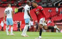 FILE: Manchester United striker Mason Greenwood celebrates after scoring the equalising goal during the English Premier League football match between Manchester United and West Ham United at Old Trafford in Manchester, north west England, on 22 July 2020. Picture: AFP