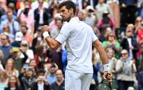 Serbia's Novak Djokovic celebrates his victory over South Africa's Kevin Anderson during their men's singles second round match on the third day of the 2021 Wimbledon Championships at The All England Tennis Club in Wimbledon, southwest London, on 30 June 2021. Picture: Ben STANSALL/AFP