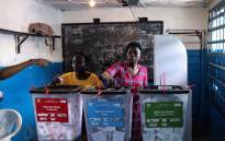  Voters cast their ballots to vote in the general elections at a voting station on 10 October 2023 in Monrovia, Liberia. Picture: JOHN WESSELS/AFP