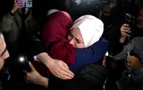 A newly released prisoner (L) greets a relative during a welcome ceremony following the release of Palestinian prisoners from Israeli jails in exchange for Israeli hostages held in Gaza by Hamas on November 30, 2023. Picture: AFP