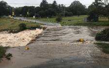 The bridge between the River Road and Belgrave in Bryanston has been closed to traffic due to flooding on 23 March 2018. Picture: Christa Eybers/EWN
