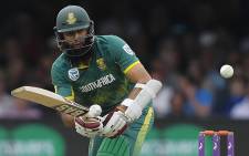 South Africa's Hashim Amla plays a shot during the third One-Day International (ODI) cricket match between England and South Africa at Lord’s Cricket Ground in London on May 29, 2017. Picture: AFP.
