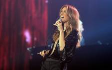 Canadian singer Celine Dion performs during her first of seven shows scheduled until 5 December at the Bercy’s Palais Omnisports on 25 November, 2013 in Paris. Picture: AFP. 