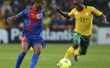 Cape Verde forward Heldon vies with Thabo Matlaba during 2013 African Cup of Nations on 19 January 19. AFP/Francisco Leong