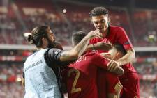 Portugal team members celebrate following their victory over Italy in their UEFA Nations Cup match in Lisbon on 10 September 2018. Picture: @selecaoportugal/Twitter