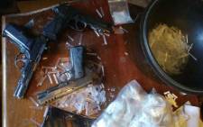 Drugs and pistols seized by members of the anti-gang unit in the Western Cape following a tipoff. Picture: SAPS. 