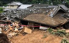 A general view shows a collapsed house following a landslide caused by torrential rain in Ashikita, Kumamoto prefecture on 5 July 2020. Picture: AFP