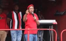 Economic Freedom Fighters (EFF) leader Julius Malema addresses supporters outside the building where state capture commission has been hearing evidence from Minister Pravin Gordhan on 20 November 2018. Picture: Abigail Javier/EWN