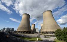 FILE: A view of the cooling towers of the Drax coal-fired power station near Selby, northern England on 25 September 2015. Picture: AFP