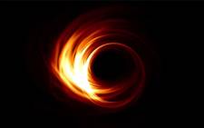 A still of a video simulation that shows what a black hole shadow might look like. Picture: EHT Outreach