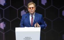 British singer Sir Elton John delivers a speech after receiving a Crystal Award from the hands of Schwab Foundation for Social Entrepreneurship Chairperson and Co-Founder during a ceremony ahead of the World Economic Forum (WEF) 2018 annual meeting. Picture: AFP