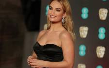FILE: British actress Lily James poses on the red carpet upon arrival at the BAFTA British Academy Film Awards at the Royal Albert Hall in London on 18 February 2018. Picture: AFP