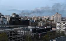 FILE: A photograph shows smoke above Kyiv after strikes on 18 April 2022, on the 64th day of the Russian invasion of Ukraine. Russian strikes slammed into Kyiv on 28 April 2022 evening as UN Secretary-General Antonio Guterres was visiting, in the first such bombardment of Ukraine's capital since mid-April, the mayor and AFP correspondents said. Picture: SERGEY VOLSKIY/AFP