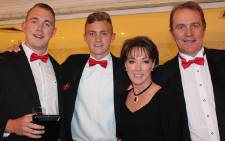 Nikki Bush pictured with her husband Simon, and their sons Ryan and Matthew. Picture: Supplied.