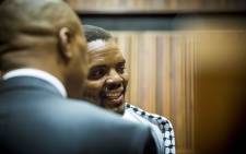 FILE: Mcebo Dlamini talks to his legal representatives before proceedings at his bail appeal began at the Palm Ridge magistrates court in Thokoza. Picture: Thomas Holder/EWN