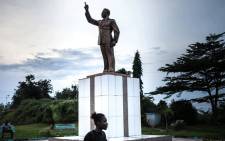 A statue of Omar Bongo is seen at a park in Franceville, Gabon, on May 21, 2019. Picture:  AFP.