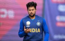 FILE: India's Kuldeep Yadav prepares to bowl in the nets as he takes part in a training session at Old Trafford in Manchester, north-west England on 8 July 2019, ahead of their 2019 Cricket World Cup semi-final match against New Zealand. Picture: AFP