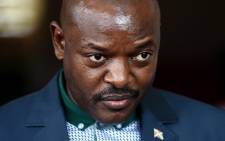 Burundi’s President Pierre Nkurunziza stands at the President’s office in Bujumbura on 17 May, 2015 as he made his first official appearance since an attempted coup against him this week. Picture: AFP.