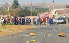 Violent protests erupted in Ennerdale as angry residents demanded demanding houses. Picture: Louise McAuliffe/EWN