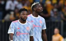 Manchester United midfielder Fred (L) and teammate Paul Pogba are seen during the UEFA Champions League Group F football match between Young Boys and Manchester United at Wankdorf stadium in Bern, on 14 September 2021. Picture: Fabrice Coffrini/AFP
