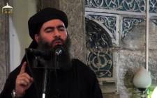 FILE: This file image grab taken from a propaganda video released on 5 July 2014 by al-Furqan Media allegedly shows the leader of the Islamic State (IS) jihadist group Abu Bakr al-Baghdadi, aka Caliph Ibrahim, adressing Muslim worshippers at a mosque in the militant-held northern Iraqi city of Mosul. Picture: AFP.