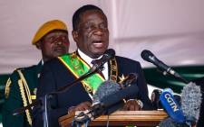 FILE: Zimbabwe President Emmerson Mnangagwa speaks during the Heroes Day commemorations held at the National Heroes Acre in Harare 13 August 2018. Picture: AFP
