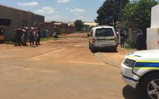 Police are stationed at most foreign-owned shops after many business owners left saying they fear for their lives. Picture: Thando Kubheka/EWN.