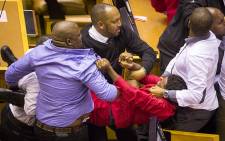 FILE: EFF MP Mbuyiseni Ndlozi is forcefully removed from the National Assembly along with other party members on 17 May 2016. Picture: Aletta Harrison/EWN