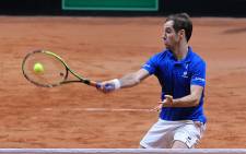 France’s Richard Gasquet returns the ball during the doubles tennis match on the second day of the Davis Cup final between France and Switzerland at the Stade Pierre Mauroy in Villeneuve-d’Ascq, northern France, on November 22, 2014. Picture: AFP